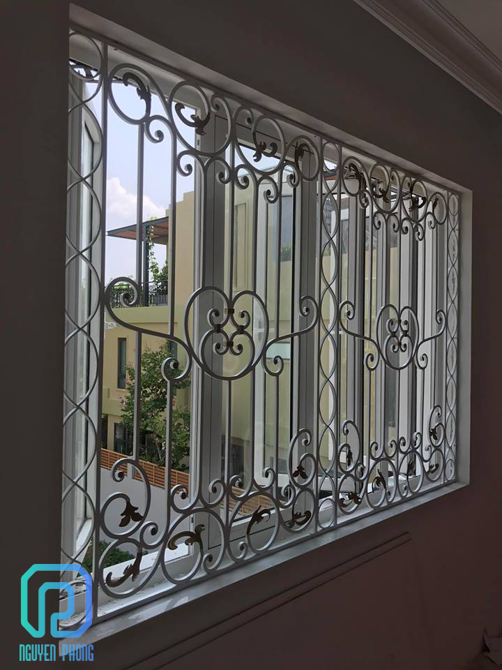 wrought-iron-window-grill-decorative-wrought-iron-grille-12.jpg