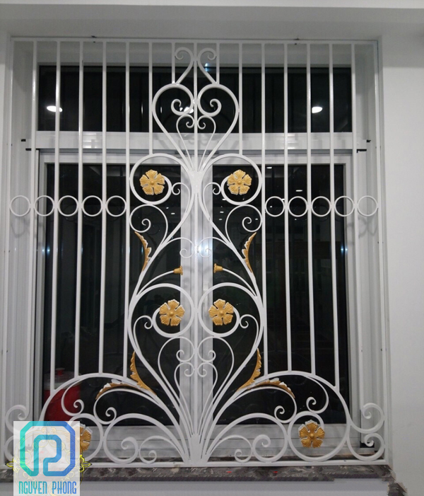 wrought-iron-window-grill-decorative-wrought-iron-grille-2.jpg